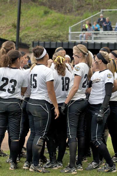 The softball team huddles Saturday afternoon during their game versus Georgia Southern. The Mountaineers lost to the Eagles 0-2 at home. Courtney Roskos | The Appalachian