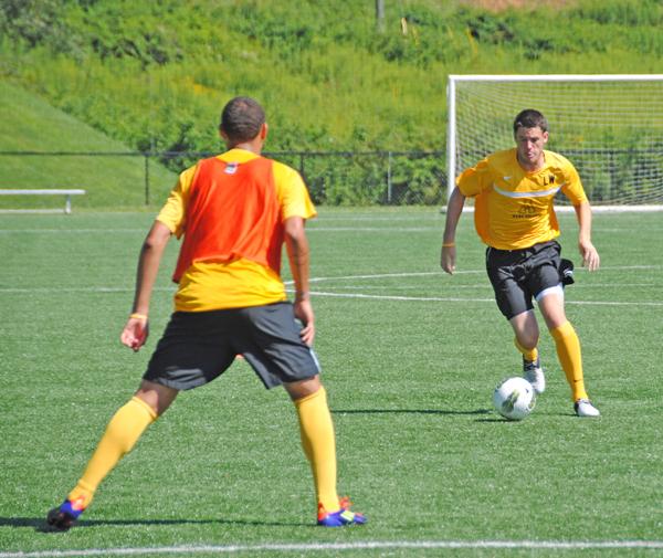 Sophomore midfielder Kristian Lee-Him prepares to capture the ball as senior defender Lee Williams approaches during Thursday mornings practice scrimmage at Ted Mackorell Soccer Complex. The mens soccer team begins its regular season Friday at home versus East Tennessee State. Olivia Wilkes | The Appalachian