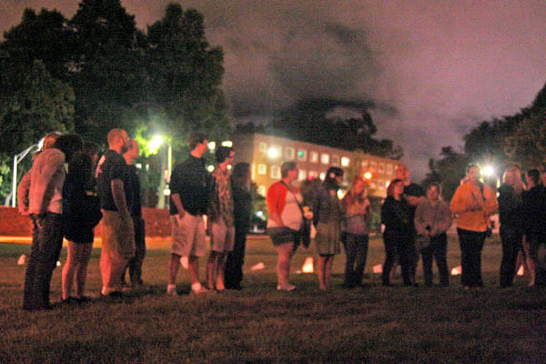 Students gather on Duck Pond Field to commemorate the recent passing of fellow student Paige Kriegel. The students organized and held a candlelight vigil, sang songs and shared memories in Kriegels honor. Maggie Cozens | The Appalachian