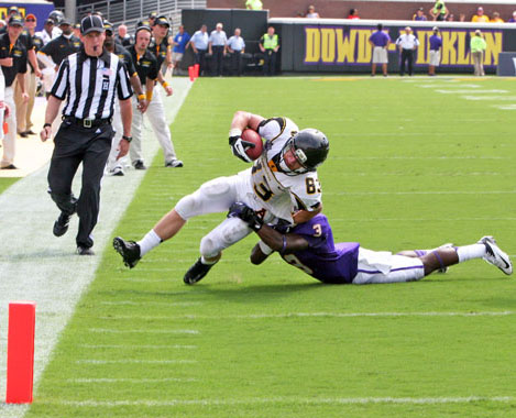 Freshman wide receiver Simms McElfresh struggles to make it to end zone during last weekends game against ECU. Appalachian lost to the Buccaneers 13-35. Amy Birner | The Appalachian