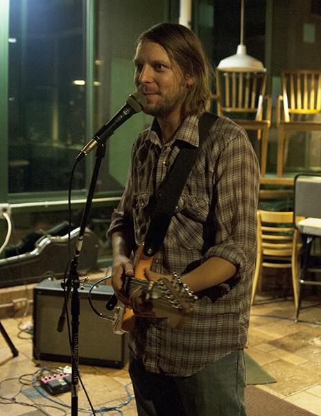 Brendon Massei of Viking Moses performs for the crowd Friday evening at Espresso News. Courtney Roskos | The Appalachian