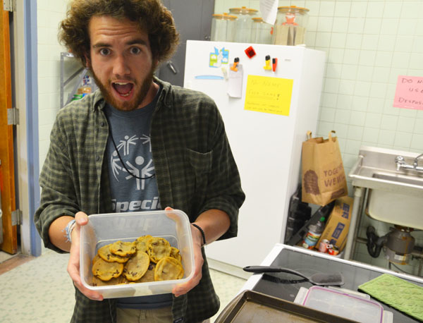 Junior public relations major Matt MIze holds up a batch of his cookies at the Wesely Foundation. Mize, who won a national award in high school for cooking, is known as the Cookie Man on campus for handing out free cookies. Michael Bragg | The Appalachian