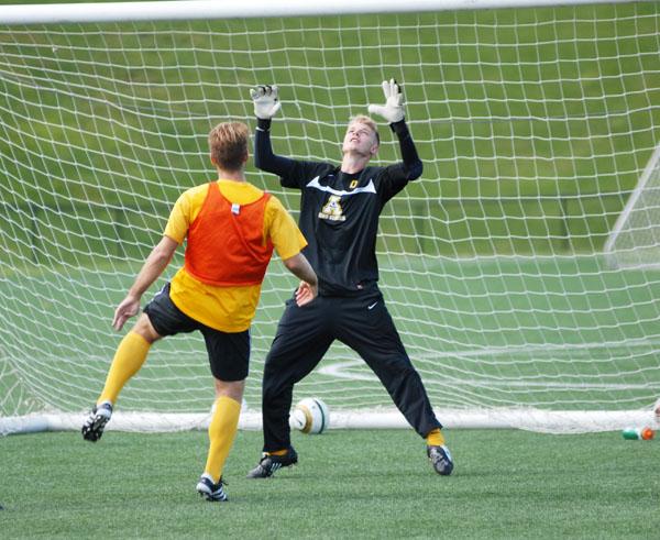 Junior goalkeeper Danny Free defends the goal during a mens soccer practice. Free came to Appalachian from Doncaster, England. Conor McClure | The Appalachian