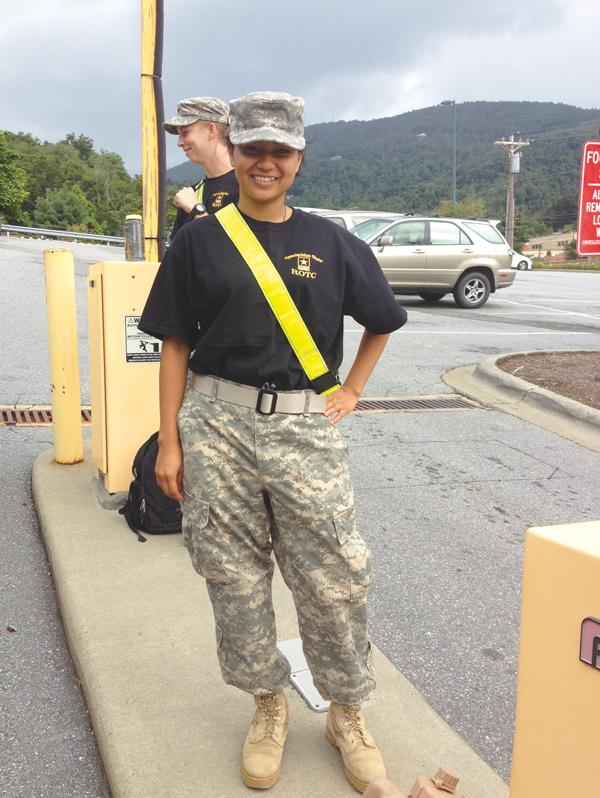 Freshman computer science major Zully Castaneda parks cars outside of the Student Rrecreation Center on Saturday before the football game. Appalachian States strong ROTC program is among the reasons the University was included on the 2013 list of "Military Friendly Schools". Aneisy Cardo | The Appalachian