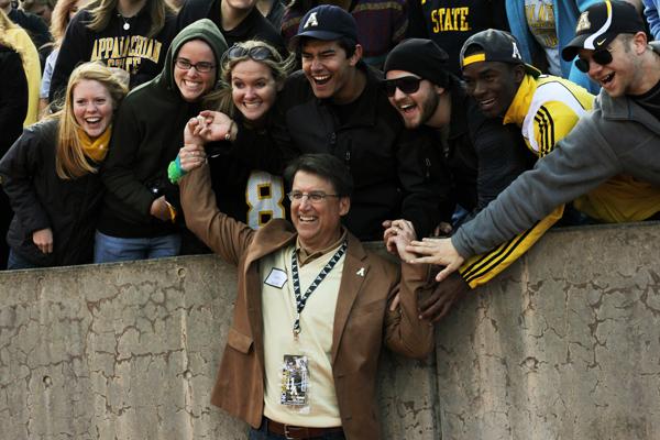 Pat McCrory, republican canidate for Governor, pauses for a picture with students at Saturdays game against Wofford. McCrory was in attendence at the game and tailgated with student organizations. Paul Heckert | The Appalachian