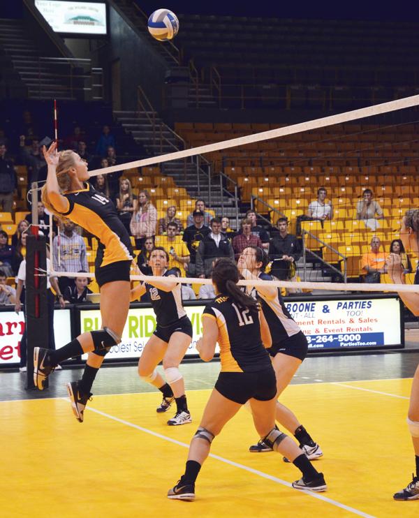 Sophomore middle blocker Lauren Gray prepares to hit the ball during Saturdays game against the Citadel. Appalachian emerged victorious with a final score of 3-1. Maggie Cozens | The Appalachian