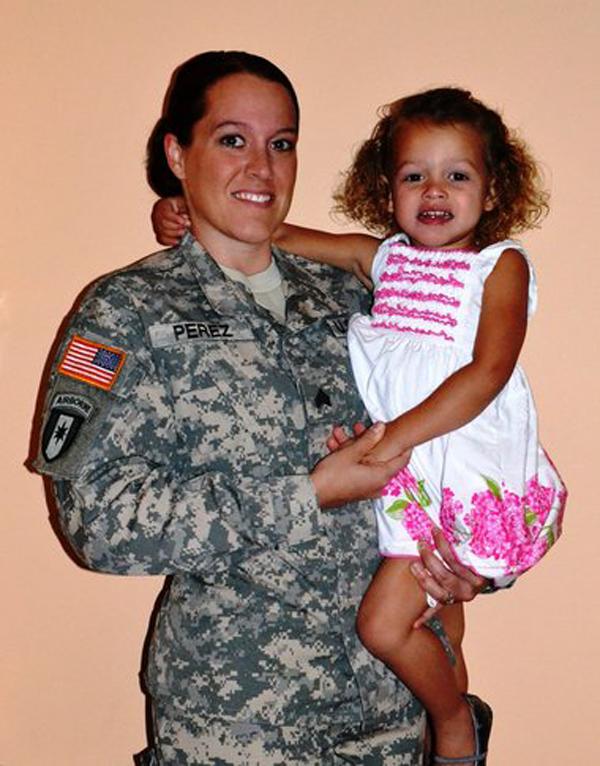 Military+veteran+Hayleigh+Perez+poses+with+her+daughter%2C+Calleigh.+After+returning+from+service%2C+Perez+was+denied+in-state+tuition+by+University+of+North+Carolina+Pembroke.+Photo+Courtesy+Hayleigh+Perez