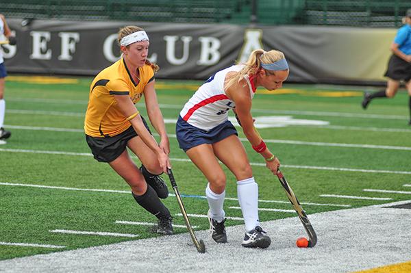 Sophomore midfielder Dana Wetmore fights for the ball during Fridays match against Liberty University. Liberty beat Appalachian 3-1. Justin Perry | The Appalachian