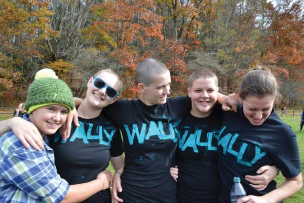 Kristen Owens stands with her fellow rugby players Miranda Miller, Abbey McLure, Mallory Johnston, and Tory Wiener at Rucktober fest on October 27. Owen was recently diagnosed with cancer and started chemotherapy about a month ago. Photo Courtesy Kristin Owen