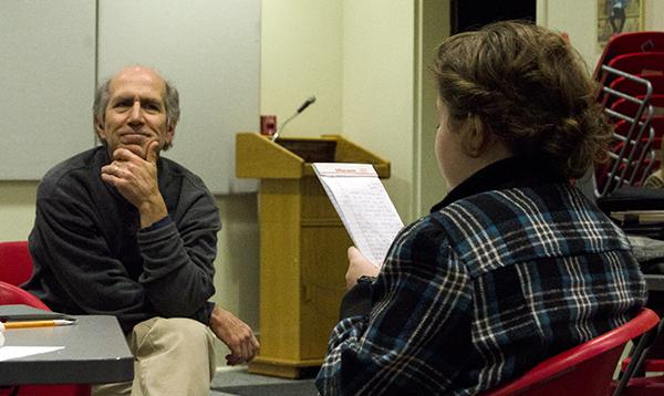 N.C. Poet Laureate and English professor Joseph Bathanti listens to a writing exercise at the Watauga County Library. Bathanti held a writing workshop to kick off National Novel Writing Month. Olivia Wilkes | The Appalachian