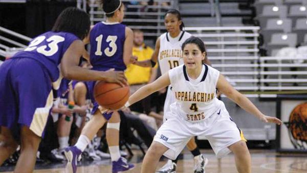 Sophomore guard Jessica Barrios defends the court during a 2010 womens basketball game. Barrios has recently rejoined the team after recovering from an ACL injury. Photo Courtesy Dave Mayo/GoAsu