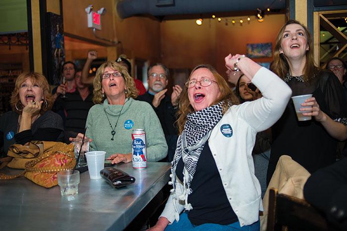 Enthusiasts gather Tuesday evening at Char as the president breaks 270 votes and snatches the election during the Democratic Viewing party. Courtney Roskos | The Appalachian