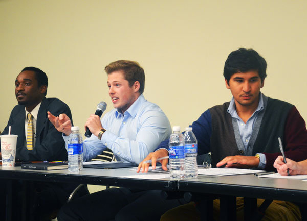 Vice chair of the college republicans senior Wesley Gwinn makes a statement at the college democrat and republican debate Wednesday night in the Blue Ridge Ballroom. Josh Farmer | The Appalachian