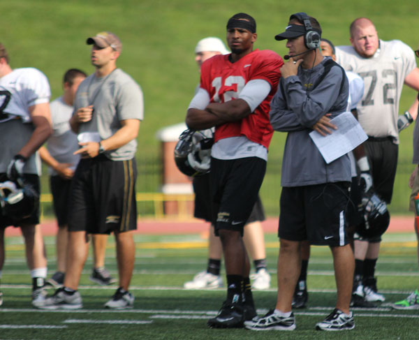 Scott Satterfield was announced as the new head coach for Appalachian State Universitys football team Friday. Here, Satterfield stands beside quarterback Jamal Jackson during an August practice. Paul Heckert | The Appalachian