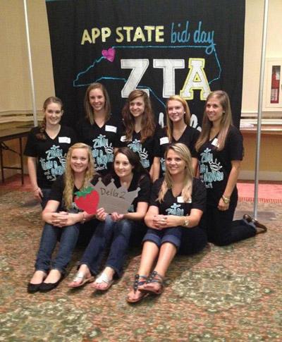 New sisters of the Zeta Tau Alpha sorority accept their bids. Zeta Tau Alpha is the newest sorority on campus and recruited 115 members last fall.