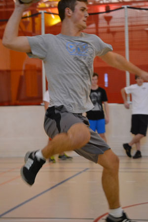 Freshman undecided major Alex Thompson winds back to throw. As part of Delta Sigma Phi rush week, members of the fraternity played dodge ball on Sunday with potential candidates.