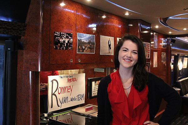 Former College Republicans Chairwoman Kelsey Crum poses for a shot at Mitt Romneys campaign bus desk. Crum is the new director of Constituent Services under Lt. Gov. Dan Forest in Raleigh.