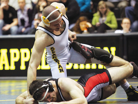 Former wrestler Kyle Blevins holds control of a Davidson opponent in a match last season. Paul Heckert | The Appalachian