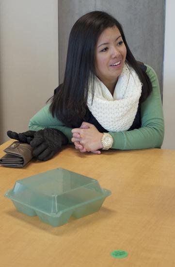 Senior economics major Frances Ramos discusses the Eco Clamshell. Student Government Association and Appalachian Food Services are testing this reusable container as an initiative to become more eco-friendly.