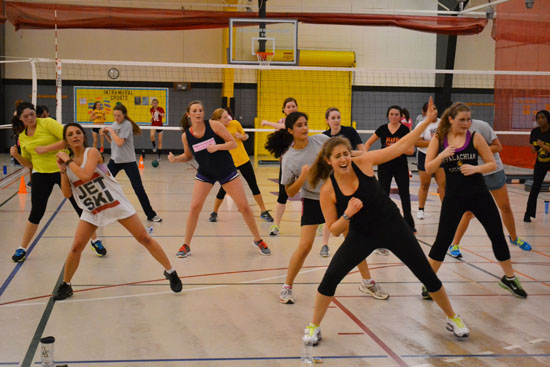 One of the four different groups take part in the three-hour fitness marathon on Sunday in Quinn Recreational Hall. The four groups moved every 30 minuets from cardiovascular and abdominals, tread and shred, high-intensity interval training and kickboxing.