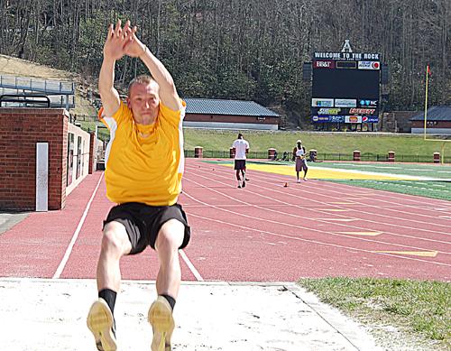 Sophomore jumper Henry Bustle practices the long jump earlier this week. He has 15 top-5 finishes, including second at the SoCon Indoor Championship. James Ashley | The Appalachian