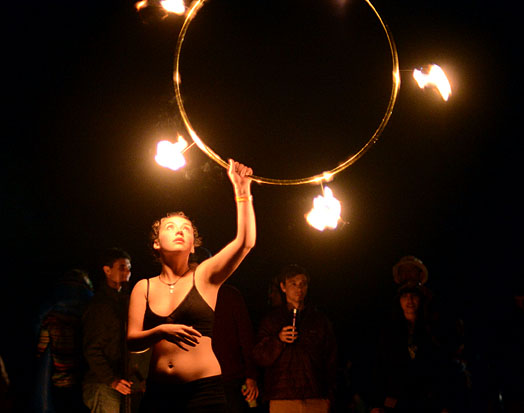 Sophomore interdisciplinary studies major Molly Clay performs fire hooping Saturday night at Boone in Blossom. Boone in Blossom was held over the weekend at High Country Fairgrounds and included musical performances, workshops, meditation sessions and more. Olivia Wilkes | The Appalachian