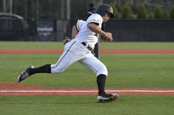 Junior outfielder Preston Troutman runs home to score during the second inning of last Tuesday’s game against N.C. A&T. The team won the game 7-3. Aneisy Cardo | The Appalachian