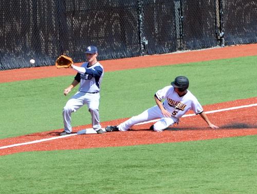 Junior outfielder William Head safely slides onto third base in Saturday’s game against Georgia Southern. Chelsey Fisher | The Appalachian