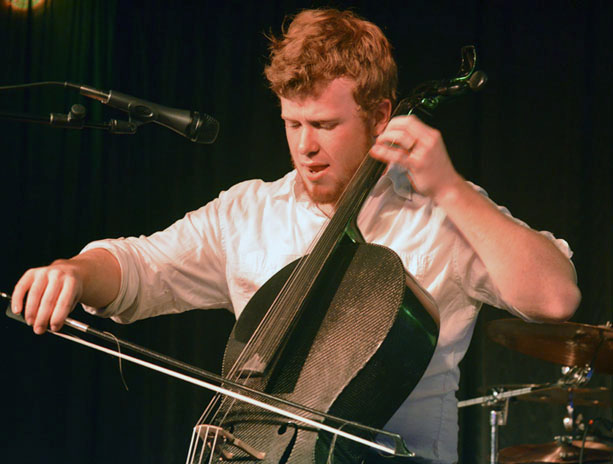 Everett Hardin, cellist of the Boone-based band the New River Boys, plays in a February performance at Legends. The New River boys will perform Thursday at Galileo’s for a fundraising event with Appalachian State’s Wine To Water Club. Michael Bragg | The Appalachian