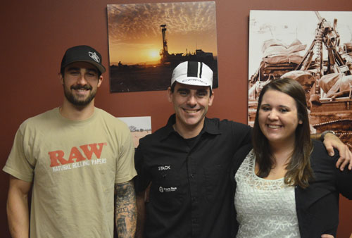 (Left to right) Wine to Water Campus and Media Coordinator Josh Elliott, Pirate Race Productions owner Andrew Stackhouse and ASU Wine to Water President Katy Cook. ASU Wine to Water helped raise $1,000 Saturday at the Boone-Roubaix Bicycle Race to go toward the nonprofits well projects in Cambodia. Michael Bragg | The Appalachian