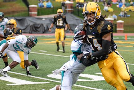 Wide receiver Sean Price makes a catch during a game in the 2012 season. Price has been suspended from an undetermined amount of games for a violation of team rules. File Photo | The Appalachian