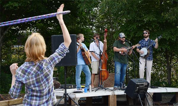 Local bluegrass band Upright and Breathin performs during the Howard Street Exchange on Sunday afternoon. Boone Community Network hosted the event downtown to support local artists and musicians. Photo by Olivia Wilkes | The Appalachian