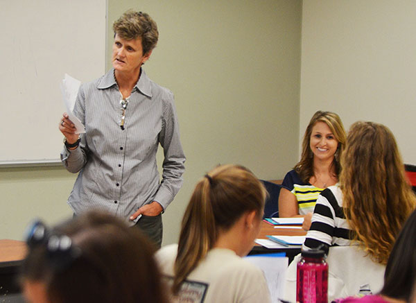 Professor Lisa Gross discusses recent North Carolina legislation with her curriculum and instruction class Monday. The state no longer requires schools to increase pay for teachers holding a master’s degree, prompting many education students to reconsider pursuing graduate school. Photo by Maggie Cozens | The Appalachian