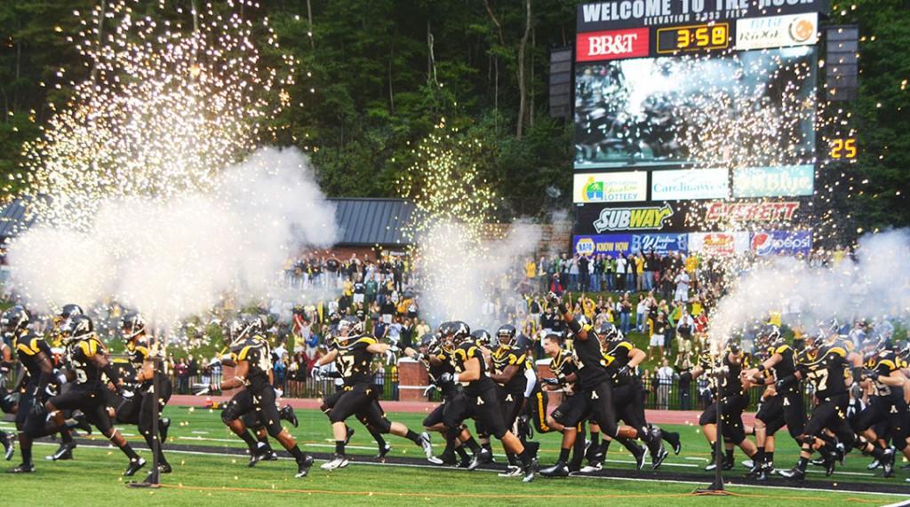 The Appalachian football team rushes onto the field Sept. 8 for their first home game of the 2012 football season. The Mountaineers faced off against Montana, taking the victory 35-27. Photo by Maggie Cozens | The Appalachian