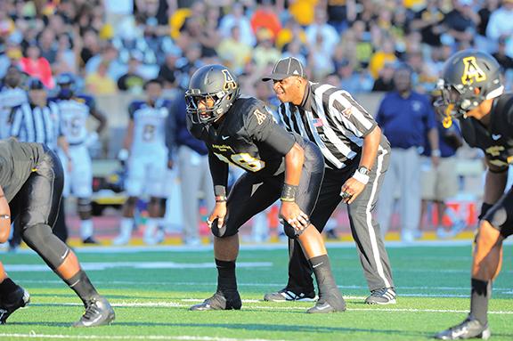 Redshirt freshman John Law lines up before the ball snaps in last Saturday’s home game against North Carolina A&T on Sept. 7. The Mountaineers lost to the Aggies 24-21. Photo courtesy of Keith Cline.