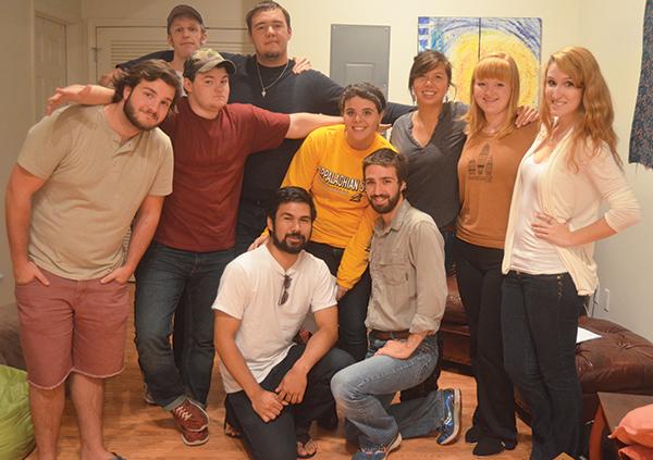 Members of the new production company Door No. 2 Productions pose for a group shot during a read-through for their upcoming performance of “The Twilight Zone.” The company was created by Appalachian students seeking to produce shows independently of the university. Photo by Maggie Cozens | The Appalachian