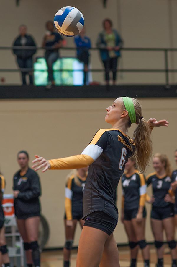 Sophomore outside hitter Emily Corrigan serves the ball during Sunday’s tournament match against the University of Texas at Arlington. Appalachian State won the Black and Gold Challenge after defeating UT Arlington and Denver. Photo by Justin Perry | The Appalachian