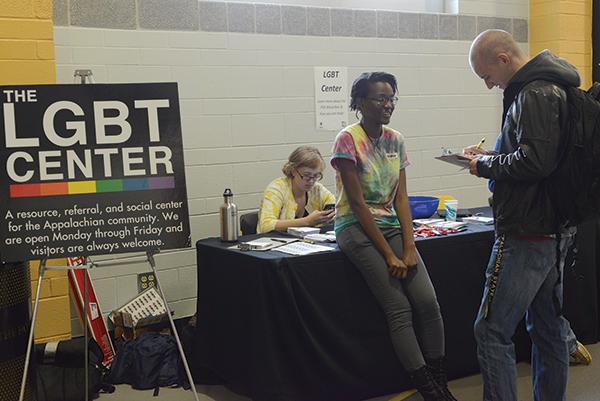 Freshman English major Amber Daniels (left) approaches freshman criminal justice major Jason Piotrowski (right) to sign the LGBT Center's petition during Wednesday's blood drive. The LGBT Center was petitioning to end the MSM Blood Bans. Photo by Courtney Roskos | The Appalachian