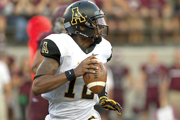 Senior quarterback Jamal Londry-Jackson looks for an open man during last Saturday’s game against Montana. The Mountaineers fell to the Grizzlies 30-6. Photo courtesy of Meghan Nolt | Montana Kaimin