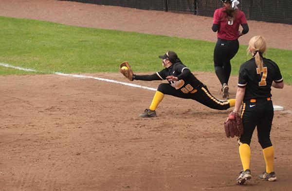 Sophomore first basemen Ellie Manriquez snags the ball with an outstretched glove in the Sunday double-header scrimmage against Lenoir-Rhyne. The Mountaineers won both games. Photo by Kim Reynolds | The Appalachian