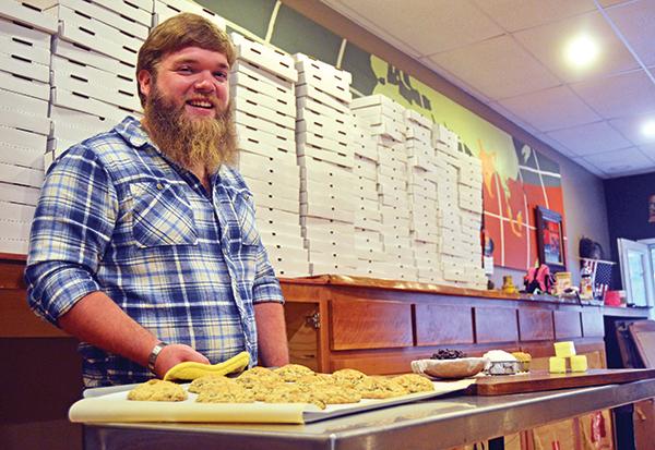 Senior entrepreneurship and marketing major David Holloman prepares for the opening of his new business, the Appalachia Cookie Company. The company, slated for an early-November opening, will make late-night cookie deliveries, cater and take shipping orders. Photo by Maggie Cozens | The Appalachian