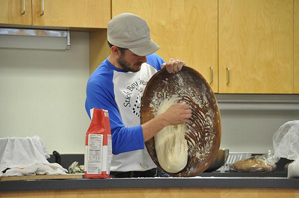 Jeremy Bollman demonstrates bread-making techniques, which he uses to create different pastries as head baker of Stick Boy Bread Company. Kim Reynolds | The Appalachian