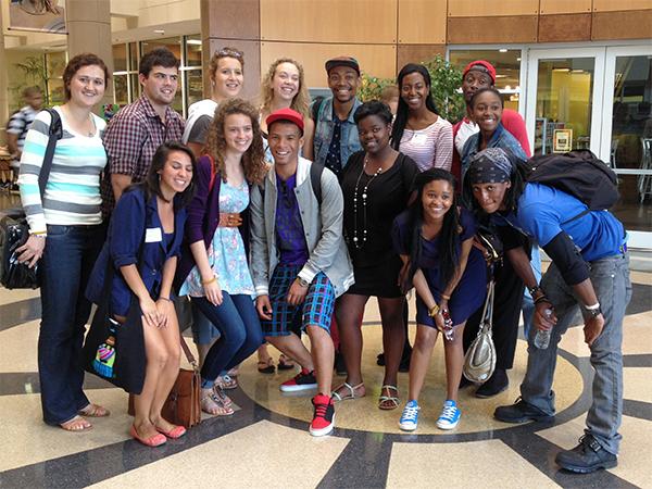 Eight students visiting from South Africa pose with students from Appalachian State University and UNC Greensboro. The students were visiting in order to learn leadership and social justice with the hopes to bring those skills back to their own campus. Photo by Laney Ruckstuhl