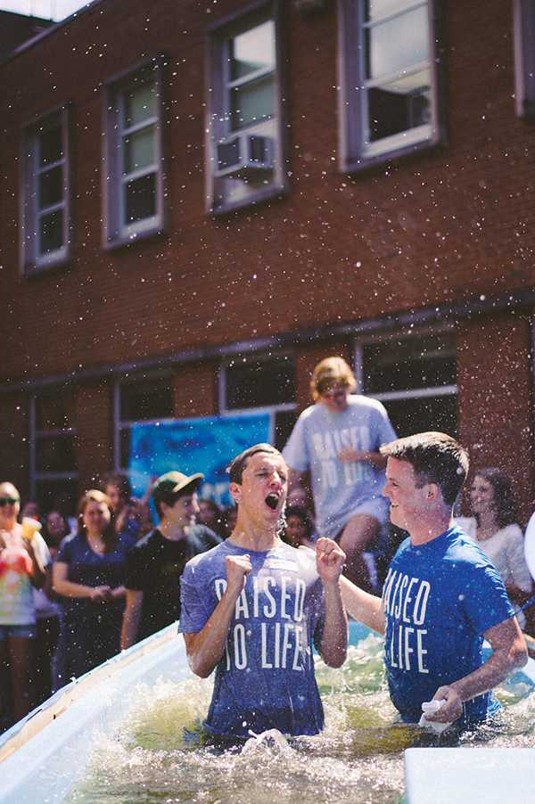 Sophomore recreation management major Weston Lawrence (left) celebrates after being baptized at Elevation Church on Sept. 22. Elevation has an average attendance of 350 students each Sunday. Photo courtesy of Erica Serrano.