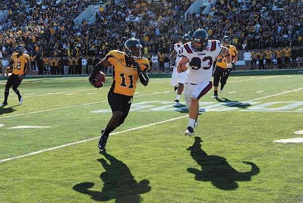 Wide receiver Andrew Peacock sprints down the field to during the 2011 homecoming game versus Samford. The Mountaineers defeated the Bulldogs 35-17 at Kidd Brewer Stadium. Photo by Olivia Wilkes | The Appalachian