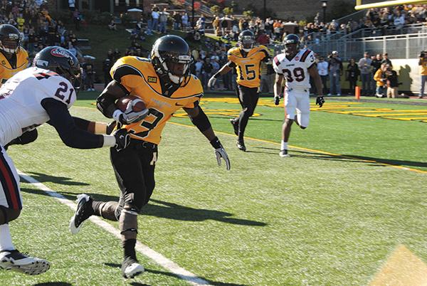 Runningback Steven Miller sprints to the endzone during the 2011 homecoming game against Samford. The Mountaineers blew past the Bulldogs for a 35-17 win. Photo by Olivia Wilkes | The Appalachian