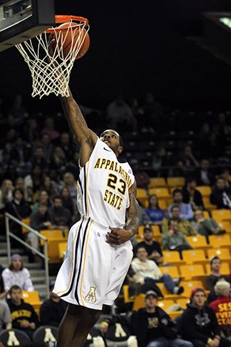 Mike Neal dunks the ball during Tuesday nights game against Lees-McRae. The Mountaineers slammed the Bobcats for a solid 91-63 win at home. Photo by Paul Heckert | The Appalachian