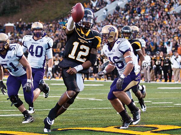 Quarterback Jamal Londry-Jackson runs for a touchdown during the Mountaineers’ 46-14 victory over Western Carolina University during the 2011 season. App State will face Western for their last SoCon game Saturday, looking to keep the Old Mountain Jug for the ninth consecutive year. Photo by Adam Jennings | The Appalachian