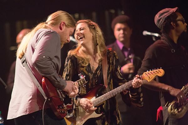 Tedeschi Trucks Band frontman Derek Trucks (left) and frontwoman Susan Tedeschi (right) pumped up the jams to a sold-out crowd Friday night at the Schaefer Center for the Performing Arts. The blues-rock duo formed the band in 2010 after they married and put their solo projects on hold to tour and record together. Photo by Paul Heckert | The Appalachian