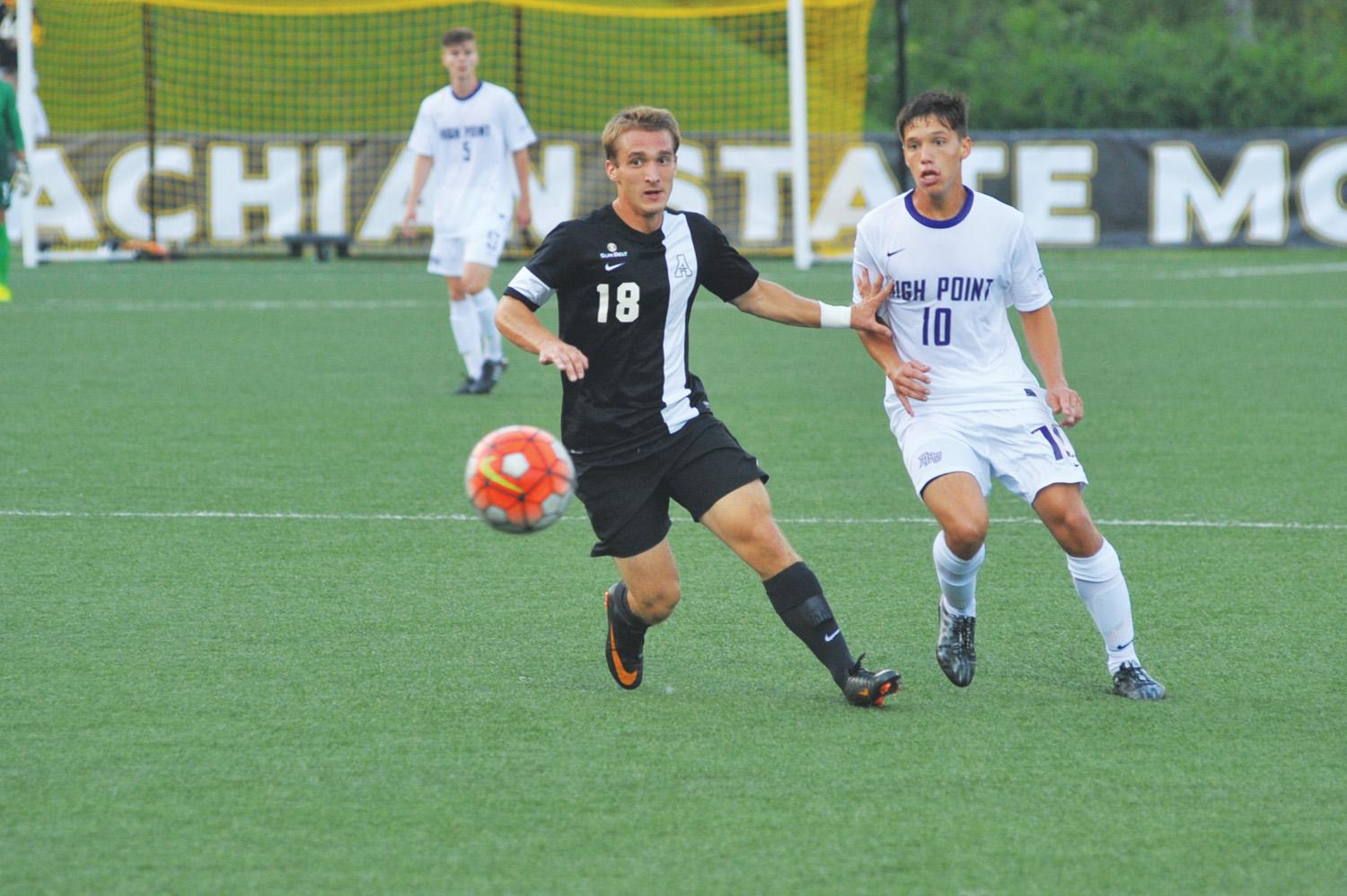 Senior mid-fielder Alex Herbst chases down the ball during Saturday’s home game against High Point. The Mountaineers secured a 5-1 victory over the Panthers. Photo courtesy of Dave Mayo  |  Appalachian State Athletics